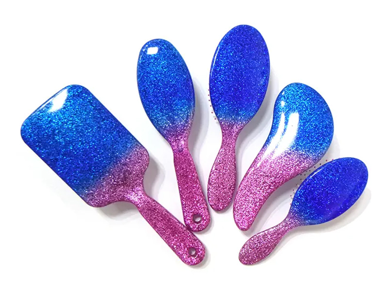 Plastikowa szczotka do suszenia włosów z wiosłem Curve Wave