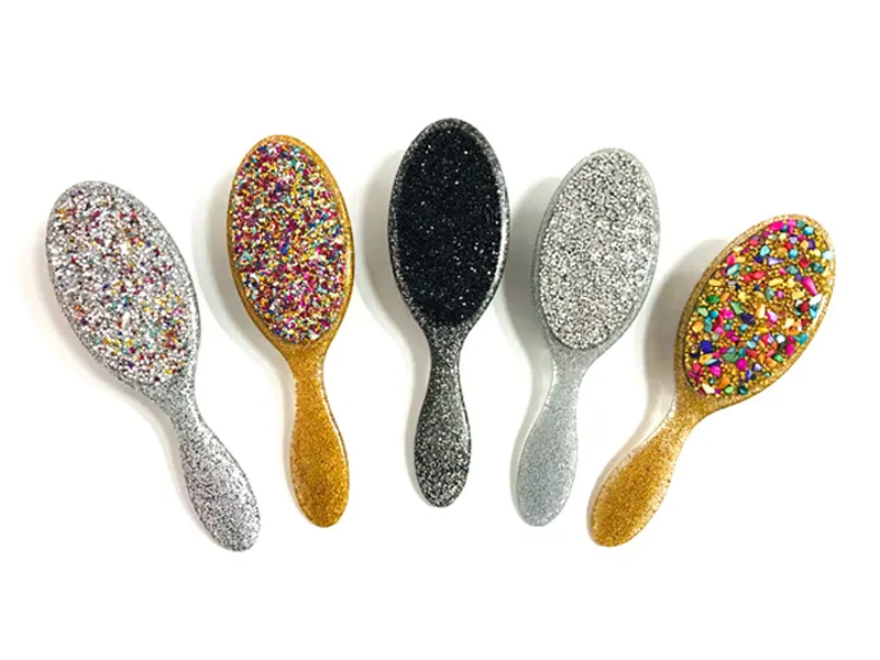 Biżuteria Bling Owalna plastikowa szczotka do włosów z rączką